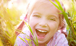 Girl laughing outside